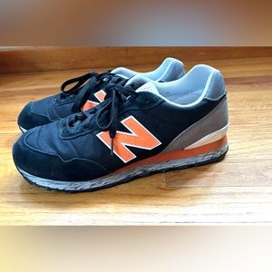 New Balance Men’s Black and Orange Sneakers Size 12